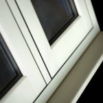 Close up flush sash wood effect window in whte